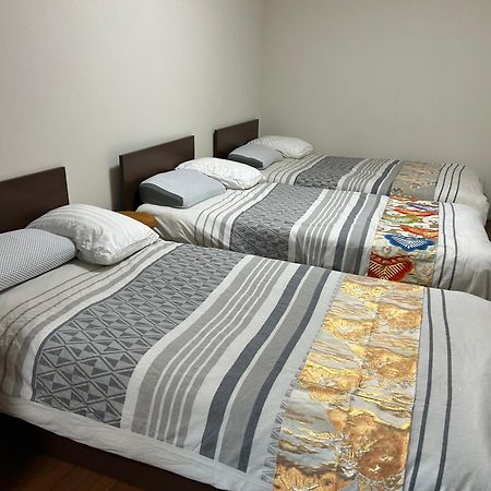 Shin-Imamiya Grand F Aparthotel Osaka Bagian luar foto