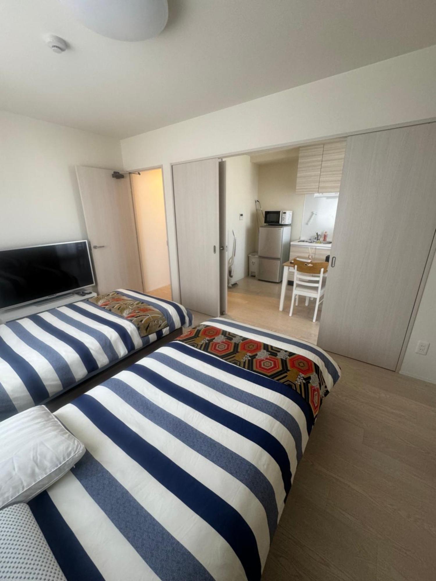 Shin-Imamiya Grand F Aparthotel Osaka Bagian luar foto