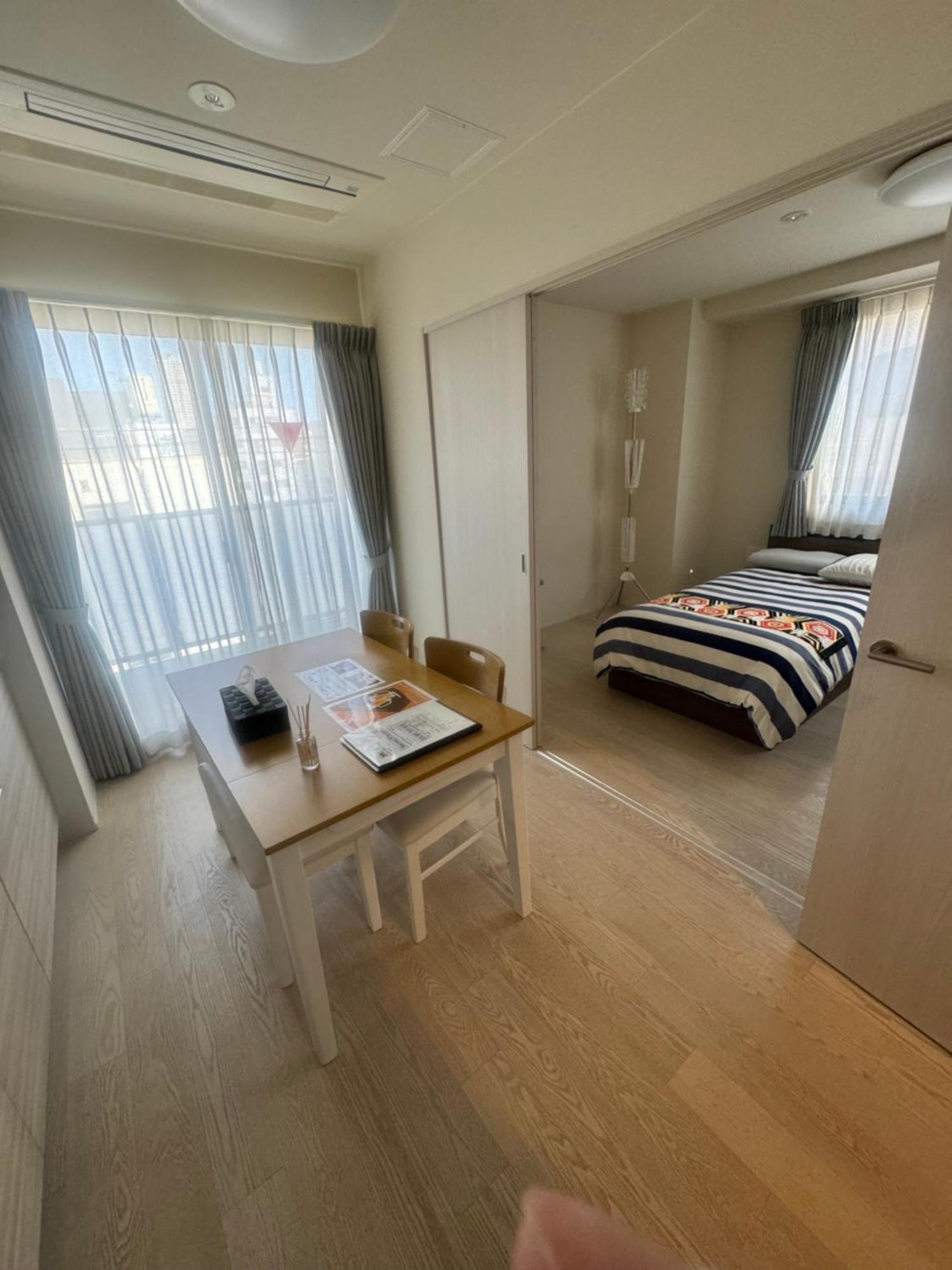Shin-Imamiya Grand F Aparthotel Osaka Bagian luar foto